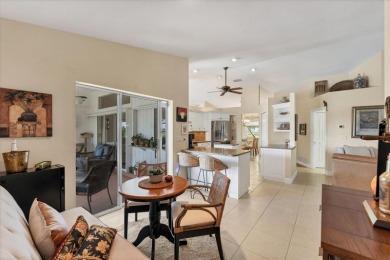 CASUAL ELEGANCE MEETS FLORIDA TRANQUILITY IN THIS FORMER MODEL on Rotonda Golf and Country Club The Palms Course in Florida - for sale on GolfHomes.com, golf home, golf lot