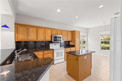 Stunning lakefront property with panoramic views of Lake on Eagle Ridge At Spruce Creek Country Club in Florida - for sale on GolfHomes.com, golf home, golf lot