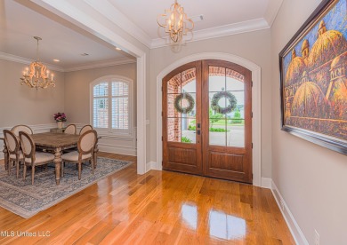 Stunning Reunion Golf Course Home with Luxurious Amenities! on Reunion Golf Club in Mississippi - for sale on GolfHomes.com, golf home, golf lot