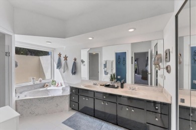 CASUAL ELEGANCE MEETS FLORIDA TRANQUILITY IN THIS FORMER MODEL on Rotonda Golf and Country Club The Palms Course in Florida - for sale on GolfHomes.com, golf home, golf lot