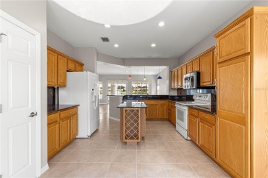 Stunning lakefront property with panoramic views of Lake on Eagle Ridge At Spruce Creek Country Club in Florida - for sale on GolfHomes.com, golf home, golf lot