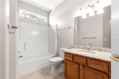 Stunning lakefront property with panoramic views of Lake on Eagle Ridge At Spruce Creek Country Club in Florida - for sale on GolfHomes.com, golf home, golf lot