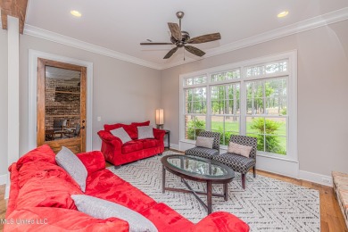 Stunning Reunion Golf Course Home with Luxurious Amenities! on Reunion Golf Club in Mississippi - for sale on GolfHomes.com, golf home, golf lot