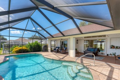CASUAL ELEGANCE MEETS FLORIDA TRANQUILITY IN THIS FORMER MODEL on Rotonda Golf and Country Club The Palms Course in Florida - for sale on GolfHomes.com, golf home, golf lot