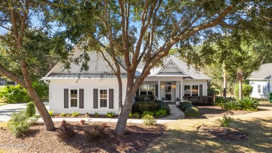 Experience the coveted Dataw Island lifestyle in this immaculate on Dataw Island Club in South Carolina - for sale on GolfHomes.com, golf home, golf lot