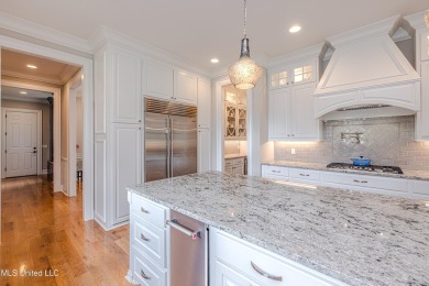 Stunning Reunion Golf Course Home with Luxurious Amenities! on Reunion Golf Club in Mississippi - for sale on GolfHomes.com, golf home, golf lot