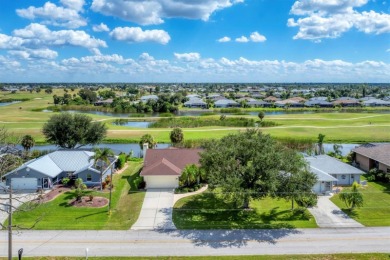 CASUAL ELEGANCE MEETS FLORIDA TRANQUILITY IN THIS FORMER MODEL on Rotonda Golf and Country Club The Palms Course in Florida - for sale on GolfHomes.com, golf home, golf lot