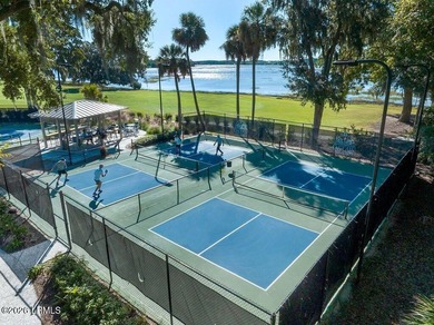 Experience the coveted Dataw Island lifestyle in this immaculate on Dataw Island Club in South Carolina - for sale on GolfHomes.com, golf home, golf lot