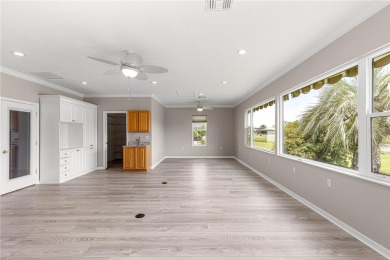 Stunning lakefront property with panoramic views of Lake on Eagle Ridge At Spruce Creek Country Club in Florida - for sale on GolfHomes.com, golf home, golf lot