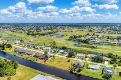 CASUAL ELEGANCE MEETS FLORIDA TRANQUILITY IN THIS FORMER MODEL on Rotonda Golf and Country Club The Palms Course in Florida - for sale on GolfHomes.com, golf home, golf lot