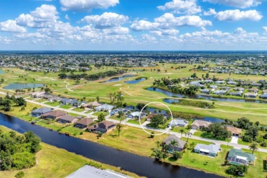 CASUAL ELEGANCE MEETS FLORIDA TRANQUILITY IN THIS FORMER MODEL on Rotonda Golf and Country Club The Palms Course in Florida - for sale on GolfHomes.com, golf home, golf lot
