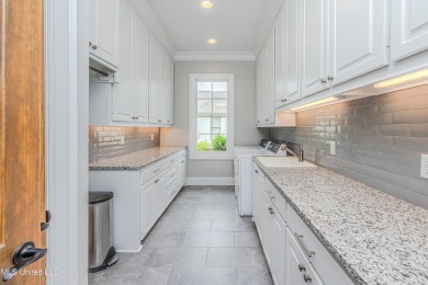 Stunning Reunion Golf Course Home with Luxurious Amenities! on Reunion Golf Club in Mississippi - for sale on GolfHomes.com, golf home, golf lot