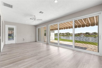 Stunning lakefront property with panoramic views of Lake on Eagle Ridge At Spruce Creek Country Club in Florida - for sale on GolfHomes.com, golf home, golf lot