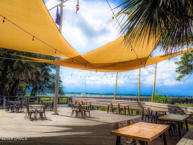 Experience the coveted Dataw Island lifestyle in this immaculate on Dataw Island Club in South Carolina - for sale on GolfHomes.com, golf home, golf lot