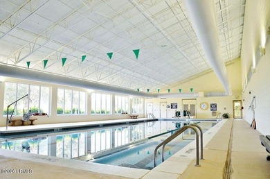 Experience the coveted Dataw Island lifestyle in this immaculate on Dataw Island Club in South Carolina - for sale on GolfHomes.com, golf home, golf lot