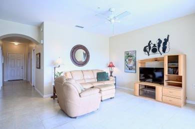 Light and bright 4th floor condo has large windows and lanai on Cedar Hammock Golf and Country Club in Florida - for sale on GolfHomes.com, golf home, golf lot