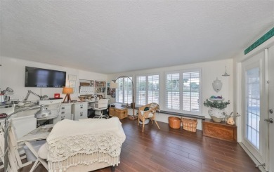 Neat POOL HOME (salt water) with a waterfall overlooking Freedom on North Lakes Golf Course in Florida - for sale on GolfHomes.com, golf home, golf lot