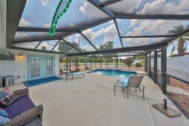 Neat POOL HOME (salt water) with a waterfall overlooking Freedom on North Lakes Golf Course in Florida - for sale on GolfHomes.com, golf home, golf lot