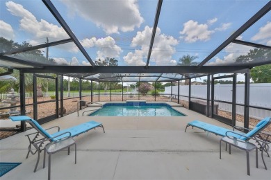 Neat POOL HOME (salt water) with a waterfall overlooking Freedom on North Lakes Golf Course in Florida - for sale on GolfHomes.com, golf home, golf lot
