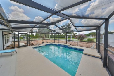Neat POOL HOME (salt water) with a waterfall overlooking Freedom on North Lakes Golf Course in Florida - for sale on GolfHomes.com, golf home, golf lot