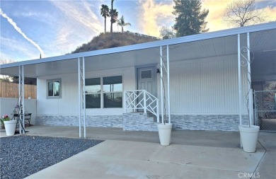Location, location, location! This adorable turnkey gem is on Canyon Lake Country Club in California - for sale on GolfHomes.com, golf home, golf lot