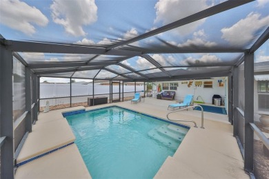 Neat POOL HOME (salt water) with a waterfall overlooking Freedom on North Lakes Golf Course in Florida - for sale on GolfHomes.com, golf home, golf lot