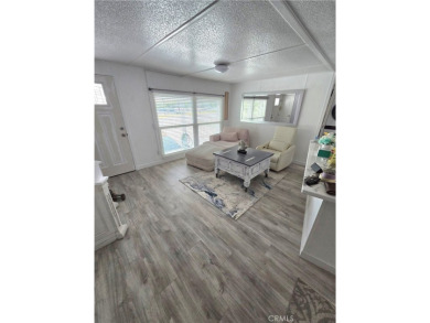 Location, location, location! This adorable turnkey gem is on Canyon Lake Country Club in California - for sale on GolfHomes.com, golf home, golf lot