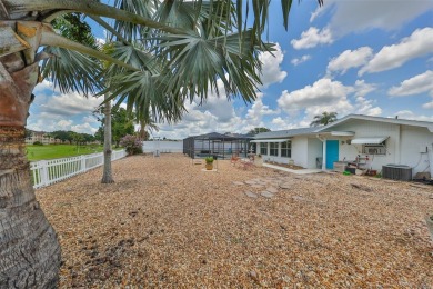 Neat POOL HOME (salt water) with a waterfall overlooking Freedom on North Lakes Golf Course in Florida - for sale on GolfHomes.com, golf home, golf lot
