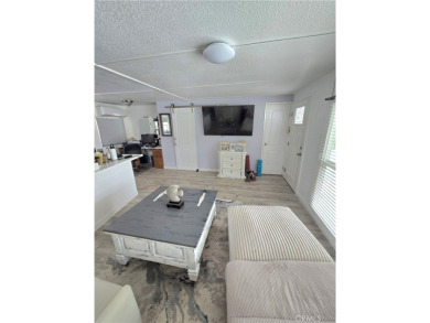 Location, location, location! This adorable turnkey gem is on Canyon Lake Country Club in California - for sale on GolfHomes.com, golf home, golf lot