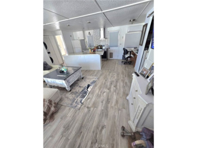 Location, location, location! This adorable turnkey gem is on Canyon Lake Country Club in California - for sale on GolfHomes.com, golf home, golf lot