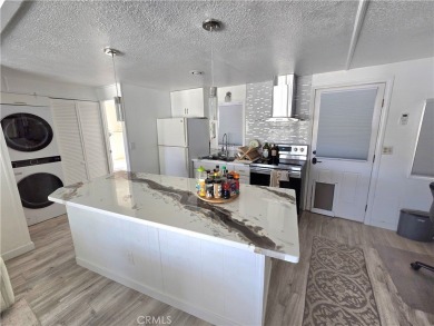 Location, location, location! This adorable turnkey gem is on Canyon Lake Country Club in California - for sale on GolfHomes.com, golf home, golf lot