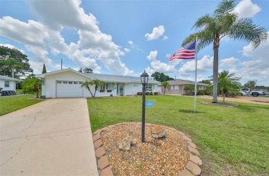 Neat POOL HOME (salt water) with a waterfall overlooking Freedom on North Lakes Golf Course in Florida - for sale on GolfHomes.com, golf home, golf lot