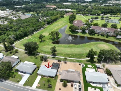 Neat POOL HOME (salt water) with a waterfall overlooking Freedom on North Lakes Golf Course in Florida - for sale on GolfHomes.com, golf home, golf lot