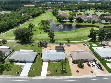 Neat POOL HOME (salt water) with a waterfall overlooking Freedom on North Lakes Golf Course in Florida - for sale on GolfHomes.com, golf home, golf lot