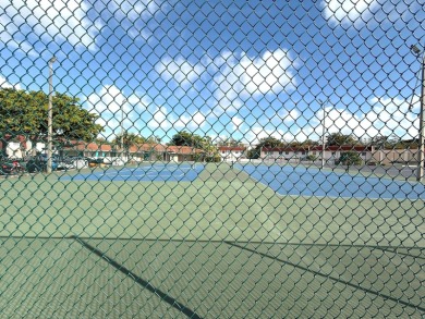 Amazing first-floor corner unit at The Manors of Inverrary! This on Inverrary Country Club in Florida - for sale on GolfHomes.com, golf home, golf lot