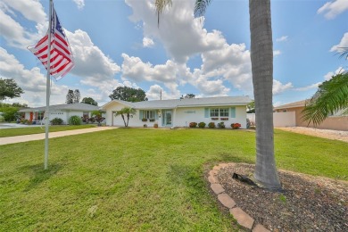 Neat POOL HOME (salt water) with a waterfall overlooking Freedom on North Lakes Golf Course in Florida - for sale on GolfHomes.com, golf home, golf lot