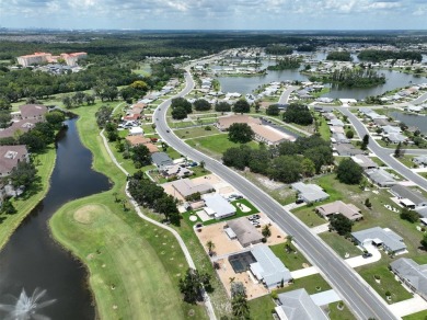 Neat POOL HOME (salt water) with a waterfall overlooking Freedom on North Lakes Golf Course in Florida - for sale on GolfHomes.com, golf home, golf lot