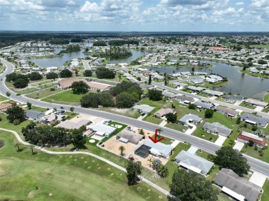 Neat POOL HOME (salt water) with a waterfall overlooking Freedom on North Lakes Golf Course in Florida - for sale on GolfHomes.com, golf home, golf lot