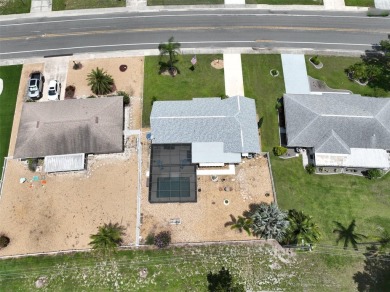 Neat POOL HOME (salt water) with a waterfall overlooking Freedom on North Lakes Golf Course in Florida - for sale on GolfHomes.com, golf home, golf lot