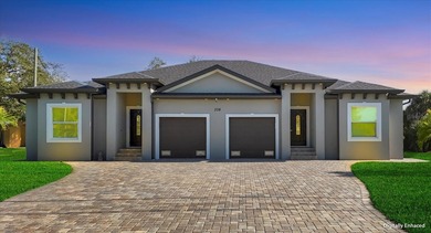 Welcome to a beautifully crafted, newer-construction duplex on Rotonda Golf and Country Club The Palms Course in Florida - for sale on GolfHomes.com, golf home, golf lot