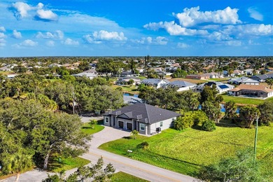 Welcome to a beautifully crafted, newer-construction duplex on Rotonda Golf and Country Club The Palms Course in Florida - for sale on GolfHomes.com, golf home, golf lot