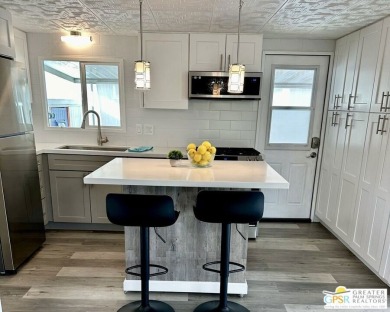 Welcome to this beautifully updated 2 bed 2 bath mobile home on Cathedral Canyon Golf and Tennis Club in California - for sale on GolfHomes.com, golf home, golf lot