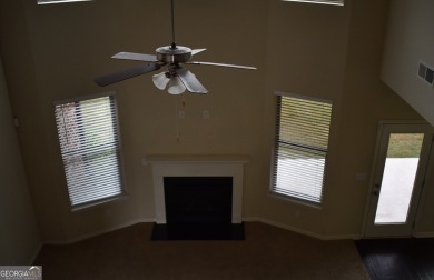 A stunning 4-sided brick ranch home perfectly situated within on Crystal Lake Golf and Country Club in Georgia - for sale on GolfHomes.com, golf home, golf lot