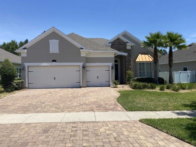 Nestled In The Serene Gated Palencia North Community You Will on The Palencia Club in Florida - for sale on GolfHomes.com, golf home, golf lot