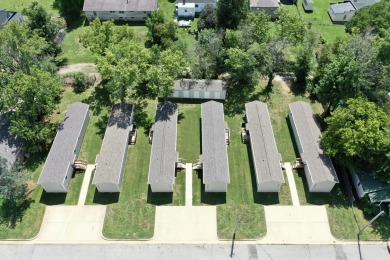 These 7 investment properties are currently income producing on West Plains Municipal Golf Course in Missouri - for sale on GolfHomes.com, golf home, golf lot