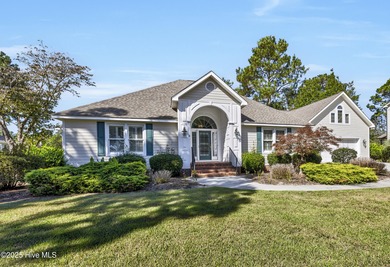 Gorgeous pond front custom home with golf course views on Carolina National Golf Club in North Carolina - for sale on GolfHomes.com, golf home, golf lot