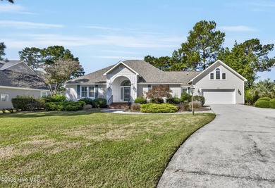 Gorgeous pond front custom home with golf course views on Carolina National Golf Club in North Carolina - for sale on GolfHomes.com, golf home, golf lot