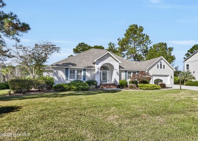 Gorgeous pond front custom home with golf course views on Carolina National Golf Club in North Carolina - for sale on GolfHomes.com, golf home, golf lot