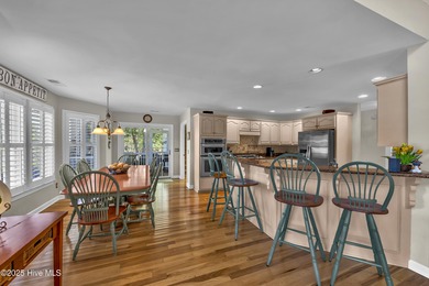 Gorgeous pond front custom home with golf course views on Carolina National Golf Club in North Carolina - for sale on GolfHomes.com, golf home, golf lot