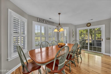 Gorgeous pond front custom home with golf course views on Carolina National Golf Club in North Carolina - for sale on GolfHomes.com, golf home, golf lot